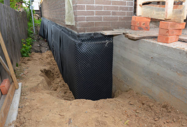 Happy homeowners after waterproofing job in Cheney